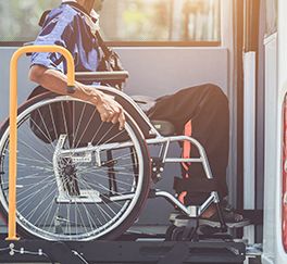 Wheelchair user boarding a bus