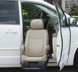 Beige car seat extending outward