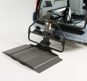 Car with mobility aid lift
