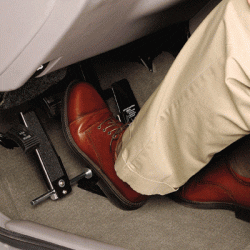 Driver's foot on vehicle pedal