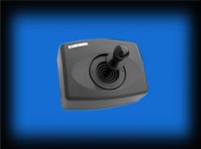 Retro gaming joystick on blue background
