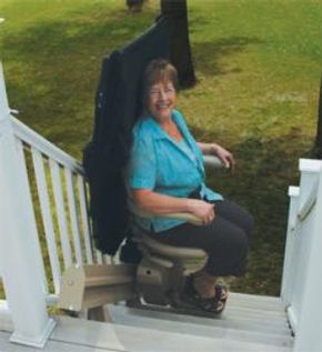 Woman using outdoor stairlift